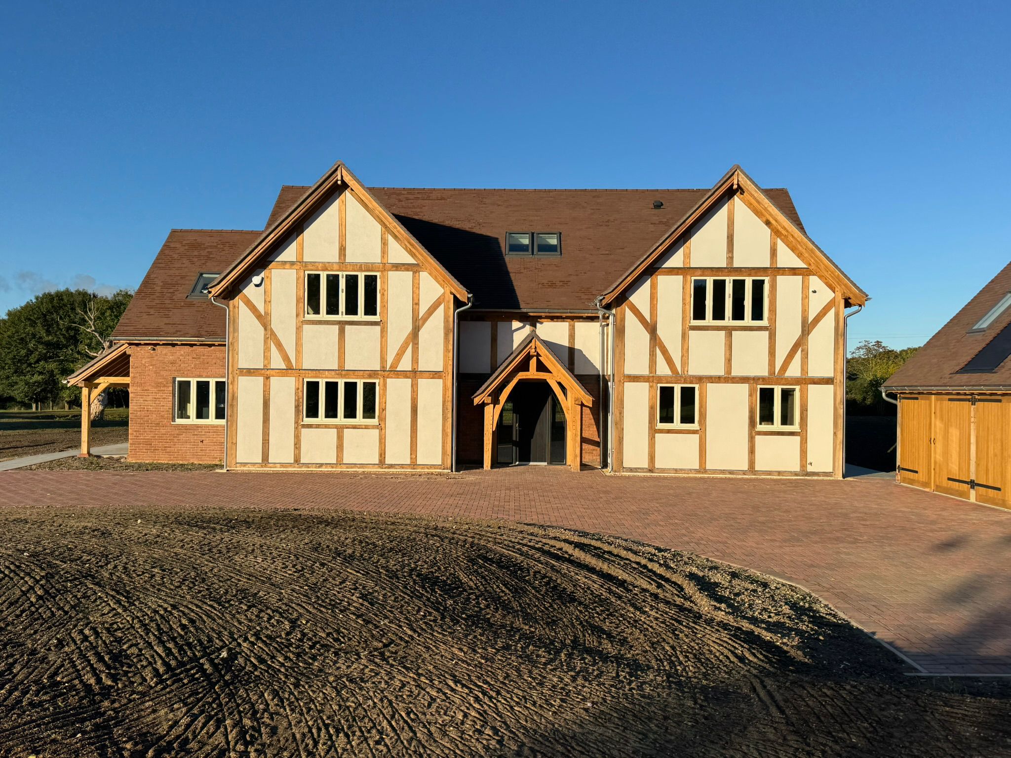 Oak-framed Tudor-style new build delivered by Jigsaw Construction Services